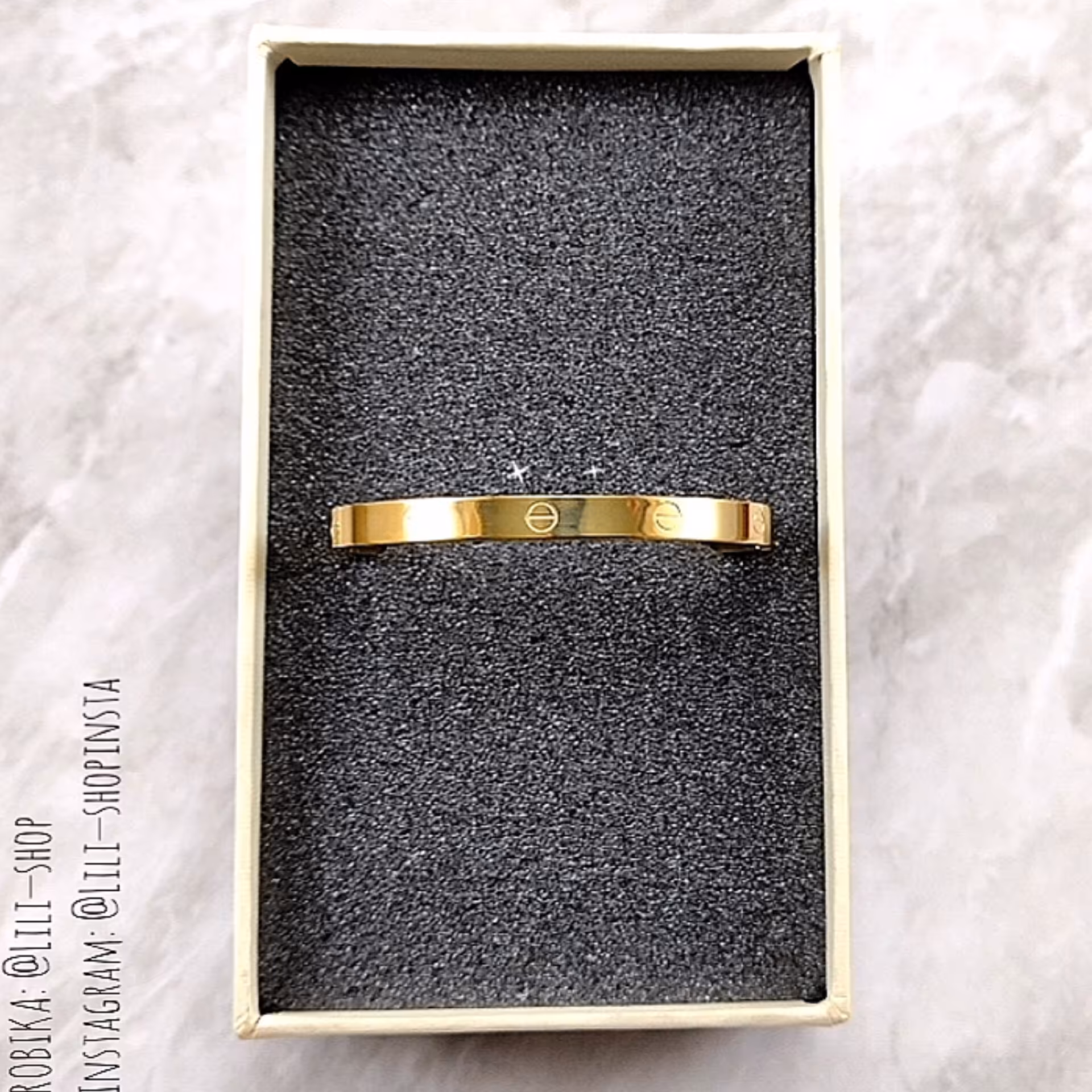 دستبند النگویی مثبت منفی بیضی