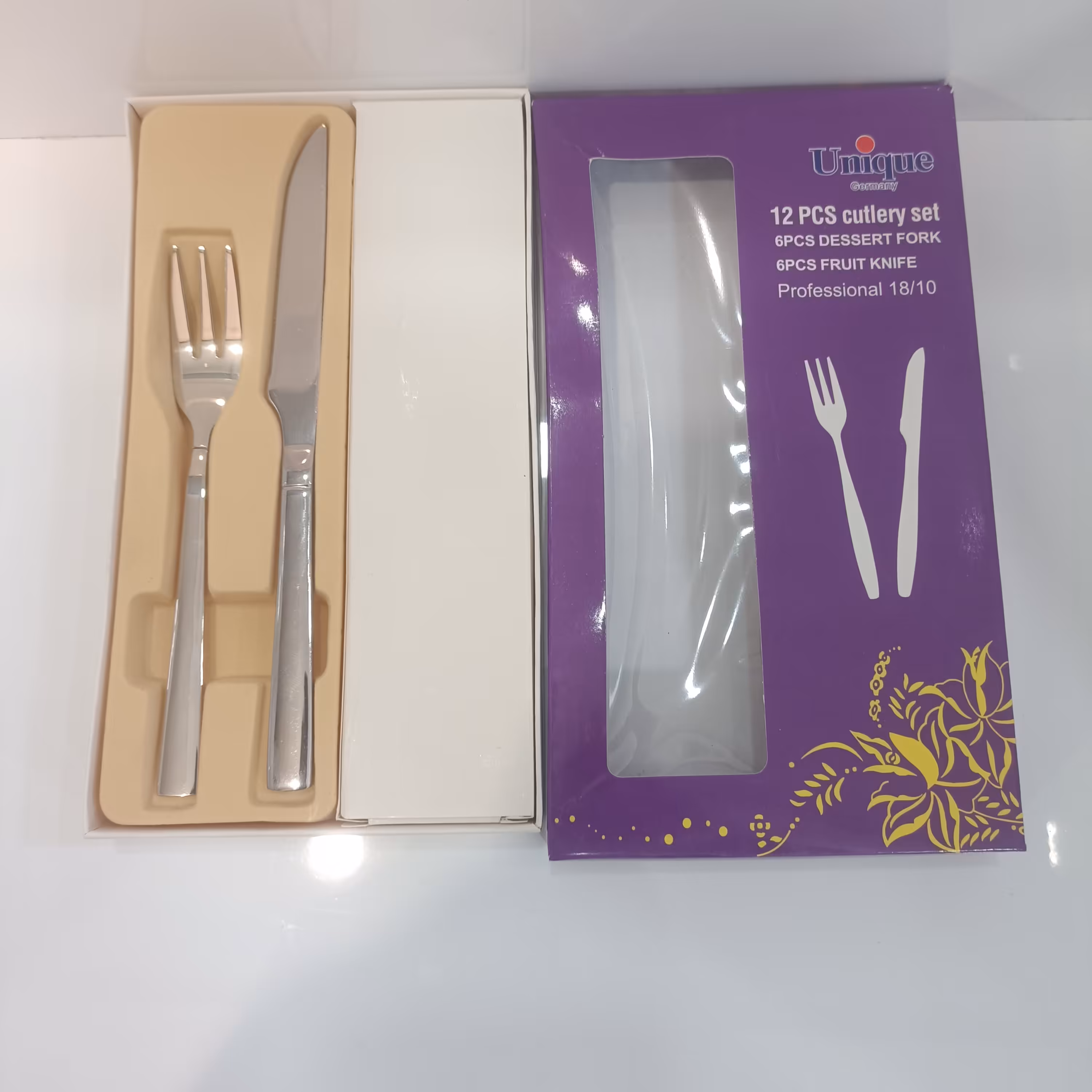 چاقو و چنگال تمام استیل یونیک جعبه بنفش چنگال استیل آهنربا نگیر ولی چاقو استیل آهن ربا بگیر میباشد