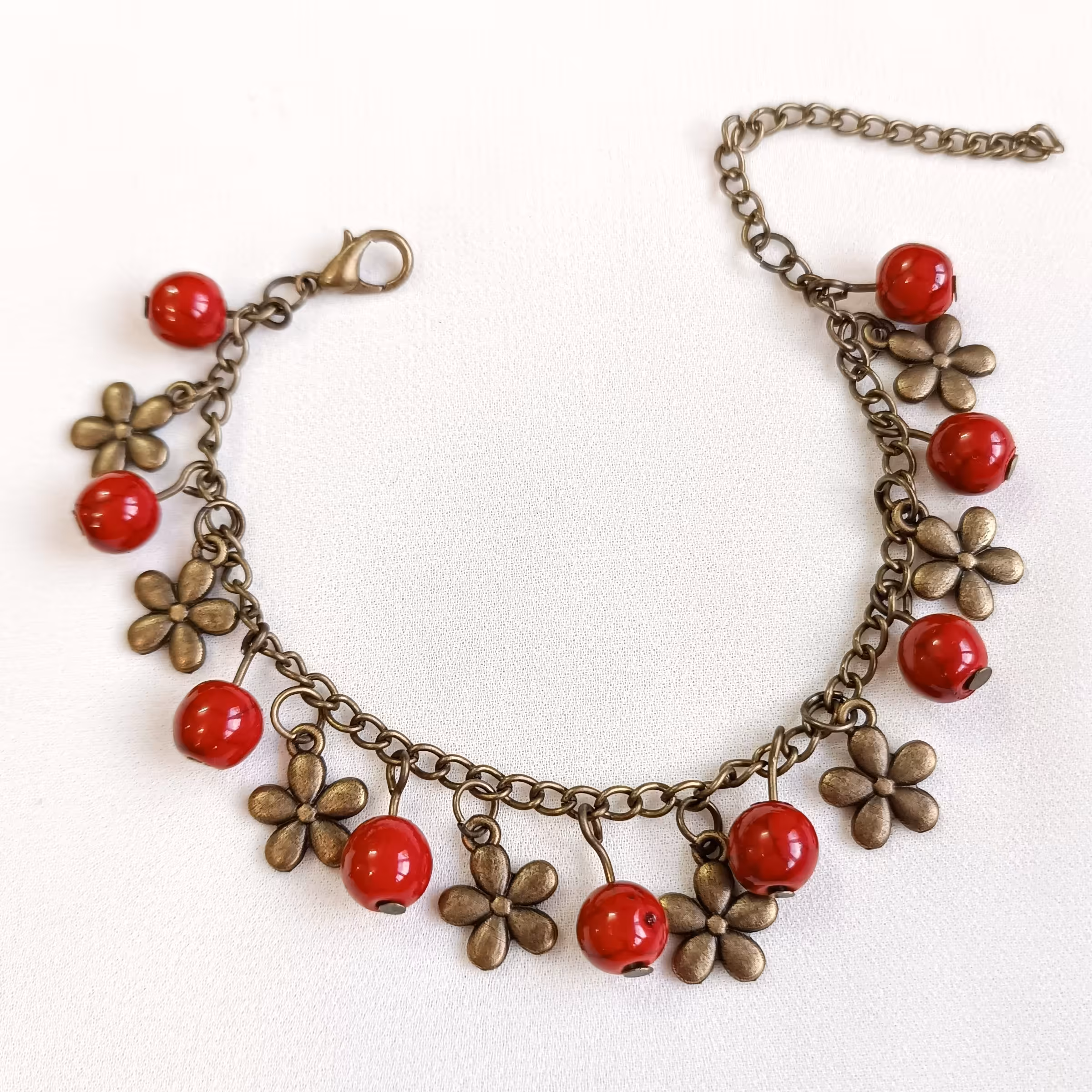 دستبند سنگ هولیت طرح مرجان برنزی قابل تنظیم سایز  بدلیجات زیورآلات دستساز سنتی 