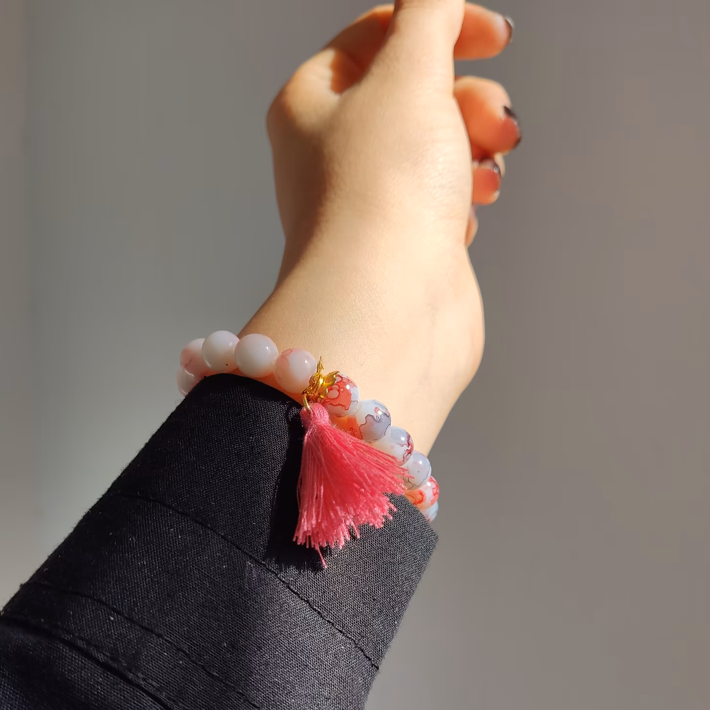 دستبند کشی منگوله دار