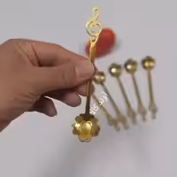 قاشق شربت و چایخوری طلایی ملودی(6تایی) قاشق چایخوری طرح گل . 