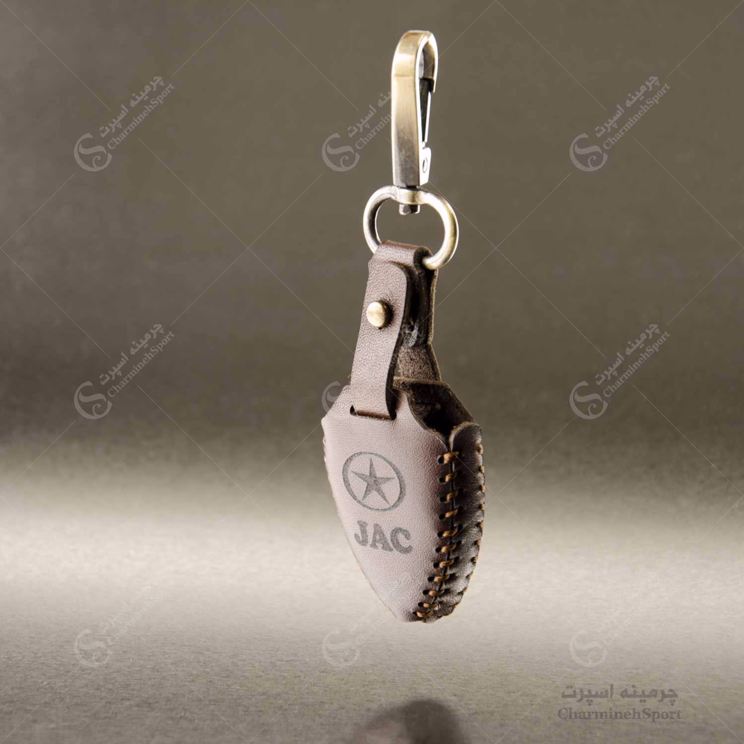 جاسوییچی چرم طبیعی گاوی قهوه ای مناسب جک مثلثی کلیدار