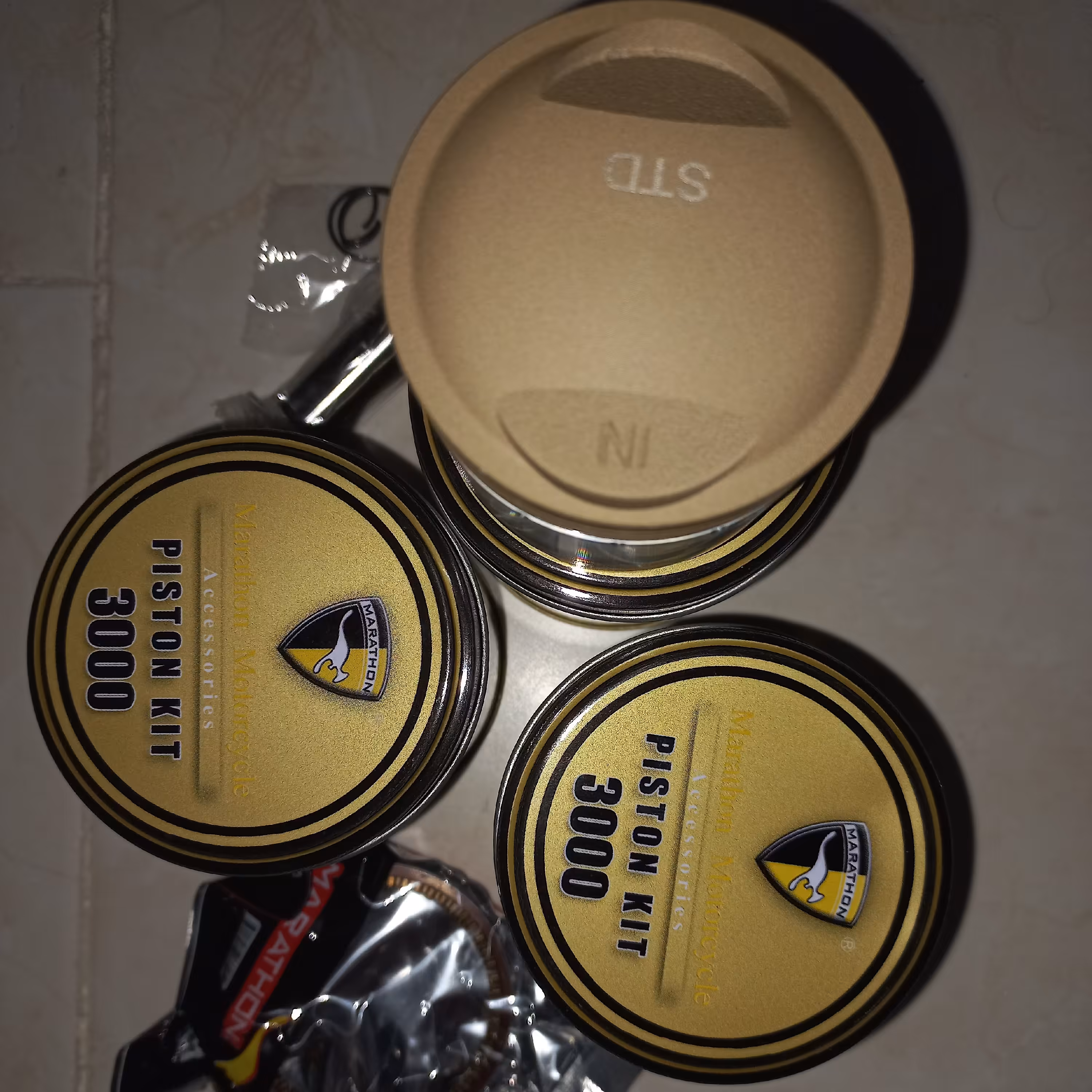 رینگ وپیستون هوندا 200 برند ماراتون(طلایی)جعبه فلزی با تضمین اصالت و مرجوعی کالا ارسال با پست پیشتاز 1الی 2روزه 