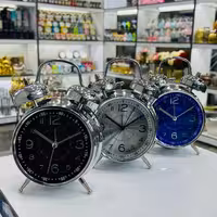 ساعت استیل صفحه رنگی ، قطر 11 سانت ، زنگدار ، چراغدار ، روان گرد