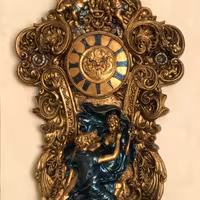 ساعت دیواری ادم و حوا طلایی و فیروزه ای