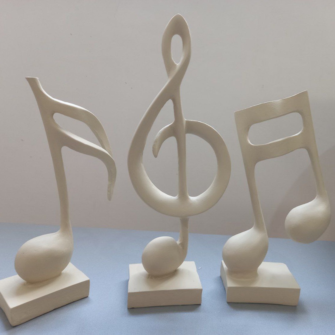 مجسمه های سه تایی نت موسیقی
