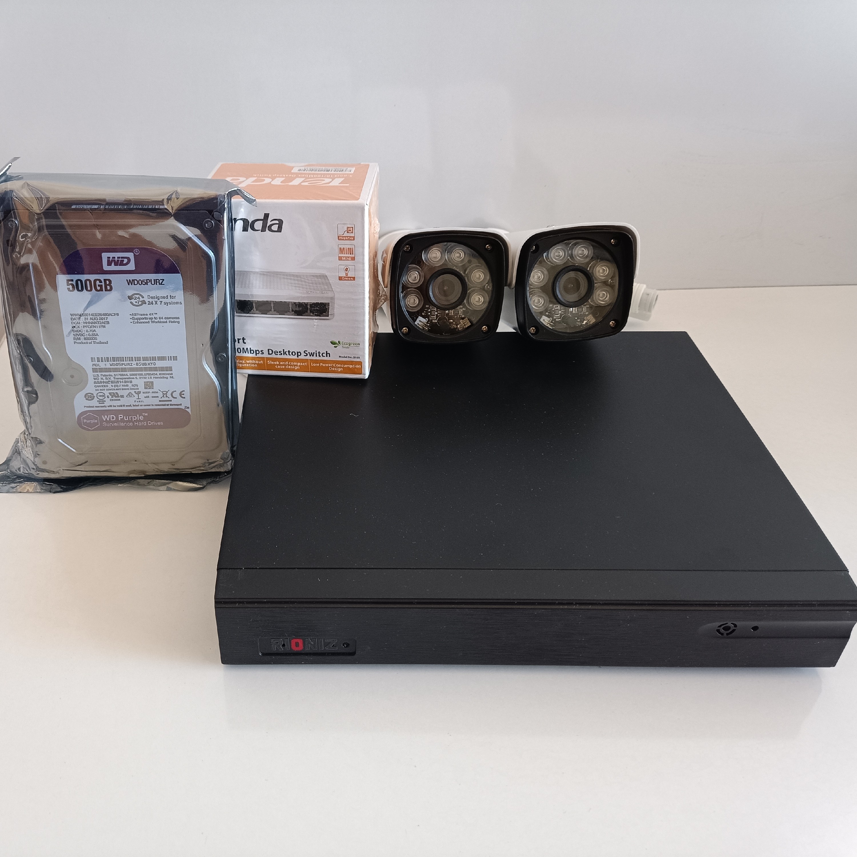 مجموعه سیستم دوربین مداربسته IP با دو عدد دوربین فول اچ دی و دستگاه ضبط و...