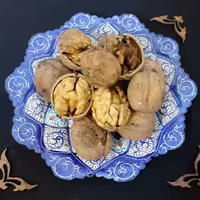 گردو محلی خوانسار پرچرب و خوشمزه ( 450 گرم ) خشکبار لاله کوهی 