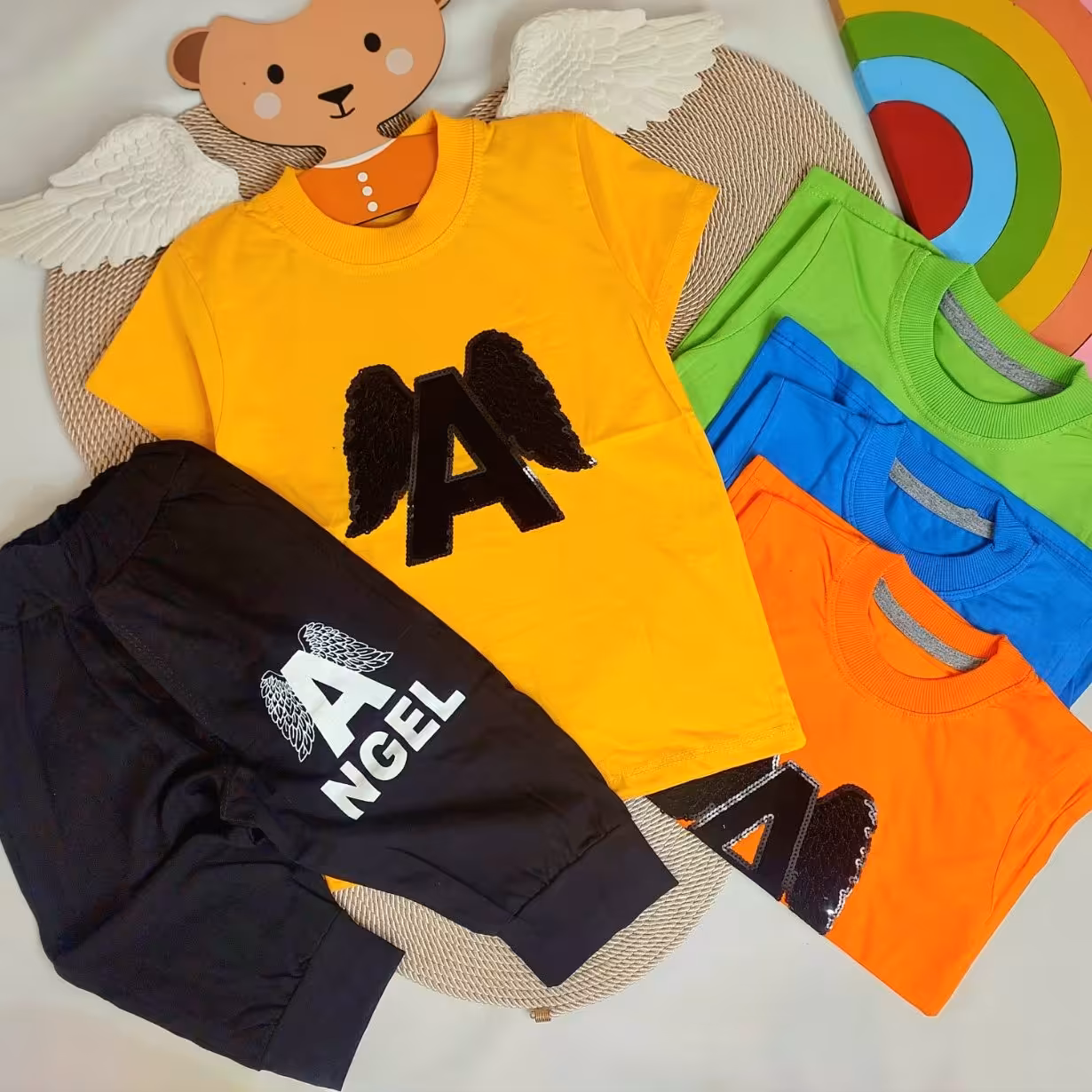 تیشرت شلوارک اسپرت طرح انجل پولک دوزی شده جنس پارچه نخ پنبه سوپر در4رنگ شیک وجذاب مناسب سن 2تا10سال 
