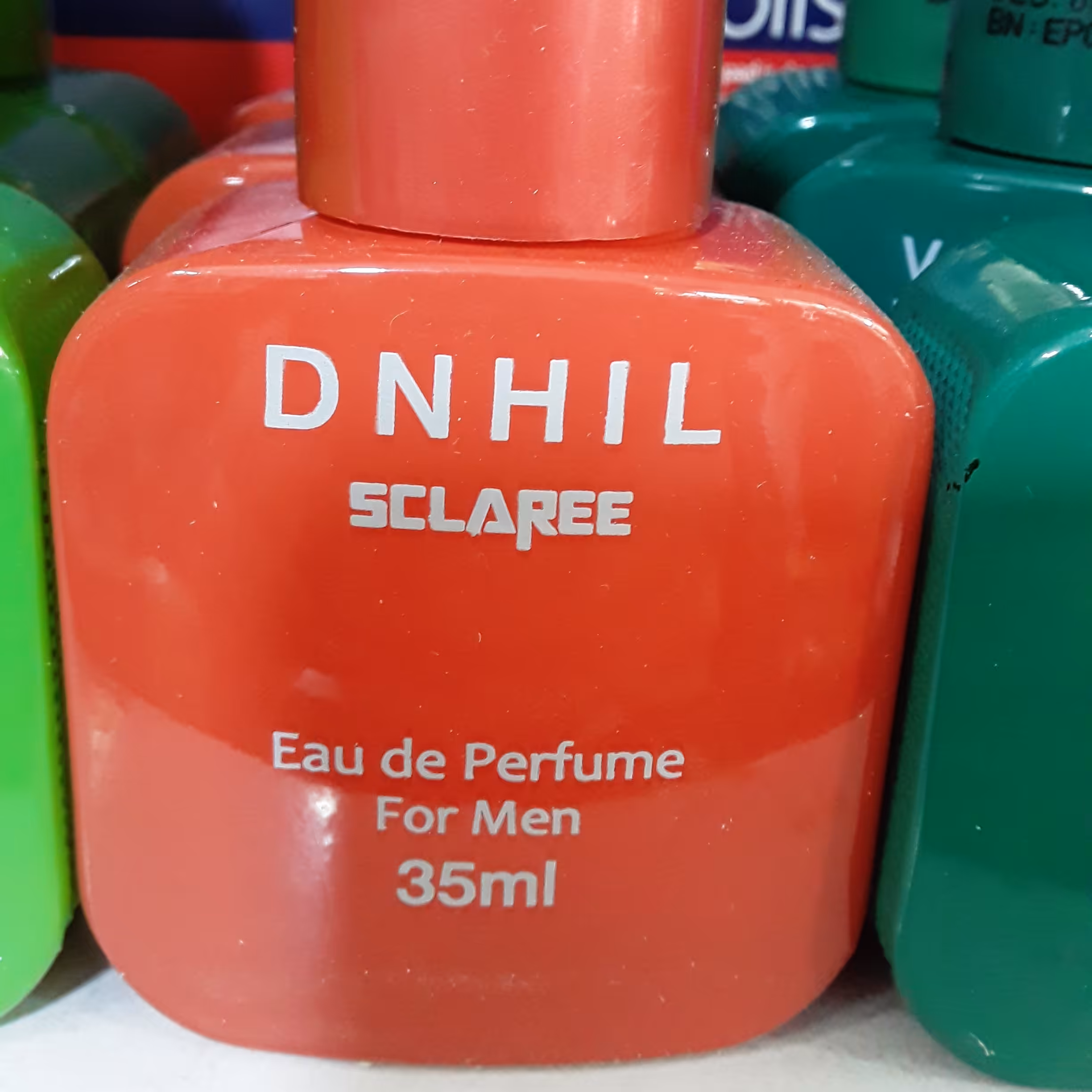 ادکلن مردانه ی دانهیل از شرکت اسکلاره 35 میل با ماندگاری بالا