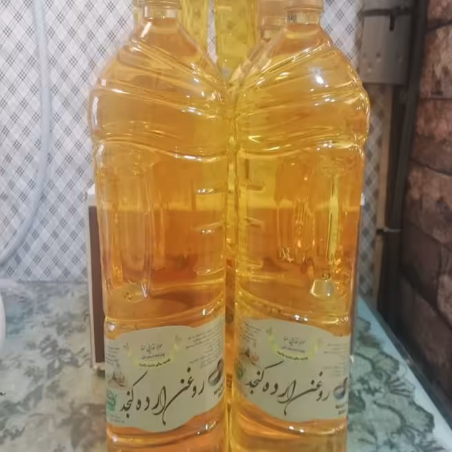 روغن ارده کنجد طبیعی و درجه یک مناسب برای همه انواع پخت در اندازه های 2لیتر