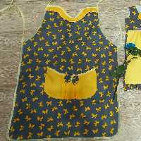 پیشبندآشپزخانه جذاب وزیبای زرد_طوسی،با طرح عالی وجنس کتان نخ باکیفیت.باقیمت مناسب،دولایه و دارای لایه ی ضد آب30000تومان