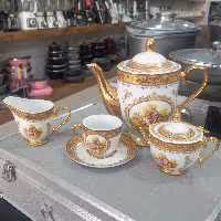 سرویس چای  خوری لرشید شامل شکر پاش وفنجان 6عدد نعلبکی 6عدد قندان یک عد خوری بزرگ یک عدد 