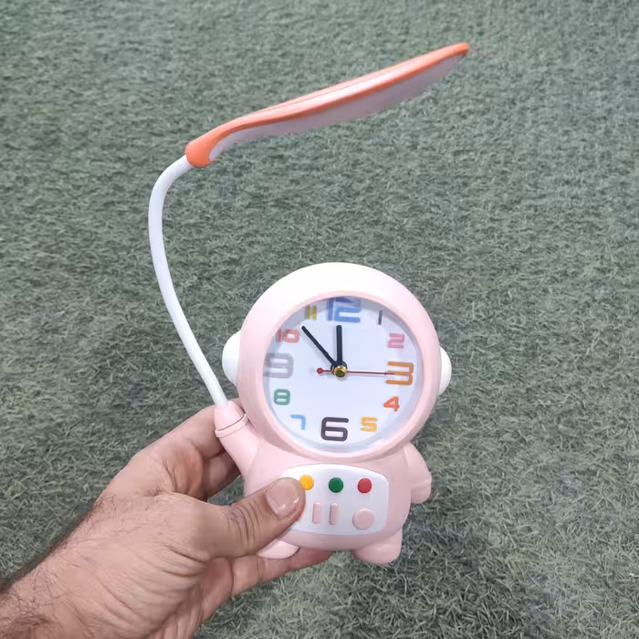 چراغ مطالعه شارژی  و ساعت  زنگ دار طرح  فضانورد 