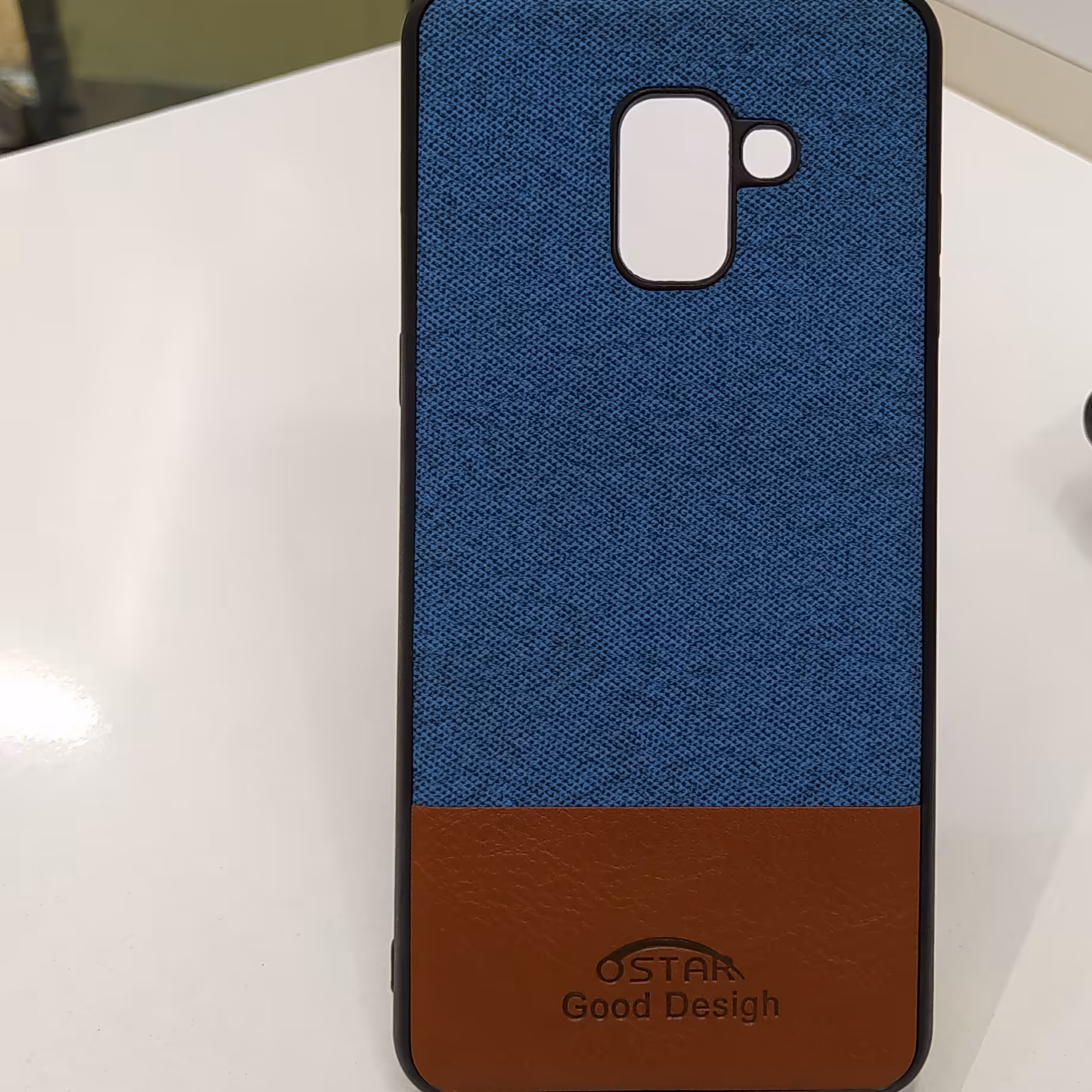 کاور گوشی کاور a8 plus مدل دور چرم پشت پارچه ای