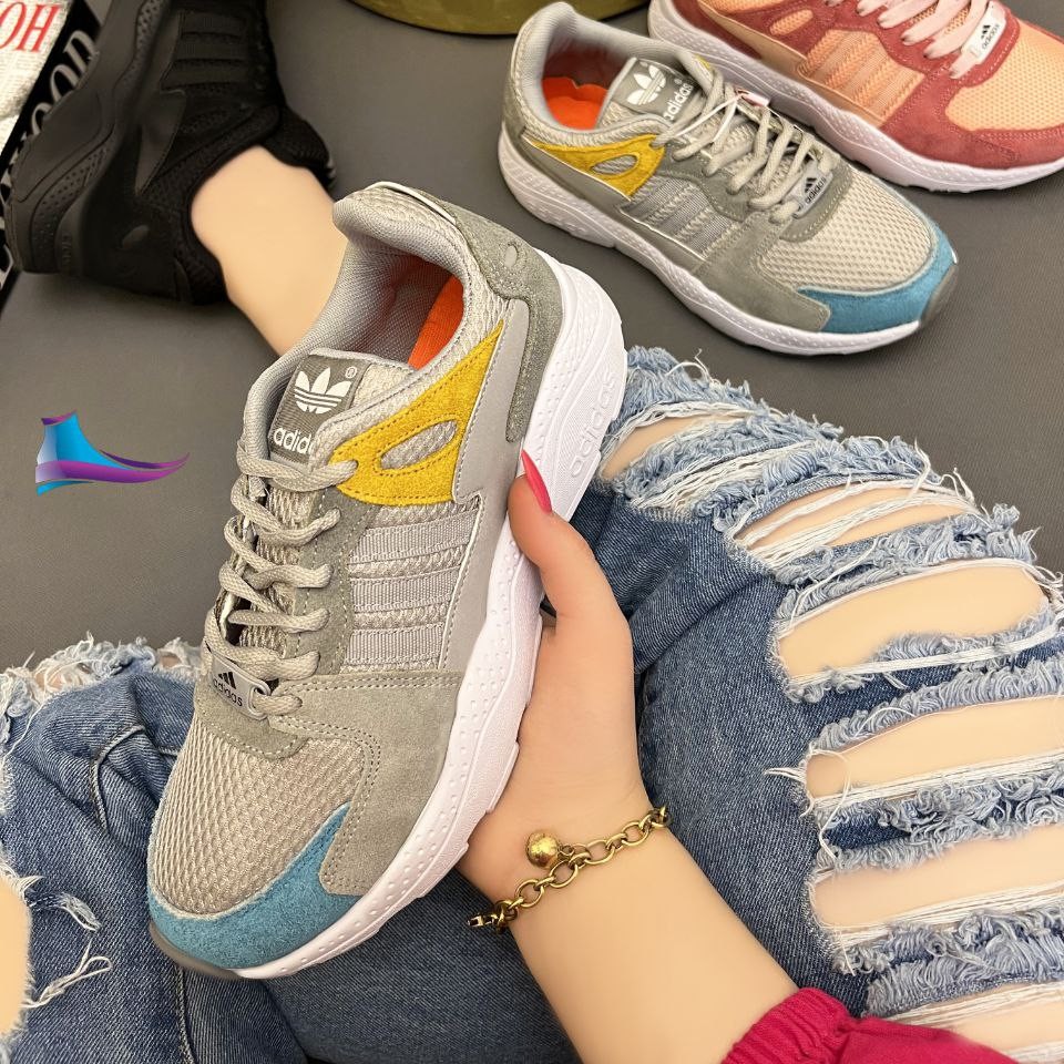 کتونی دررنگبندی قالی استاندارد زیره و رویه خارجی سبک و راحت جنس تضمینی قیمت عالیی