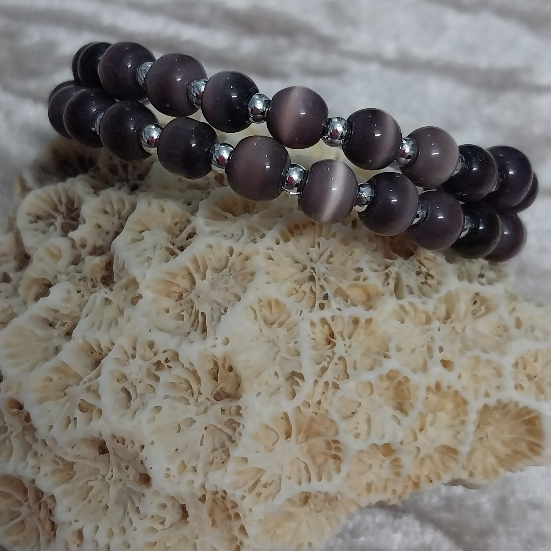 دستبند فنری چشم گربه بنفش شیک و زیبا