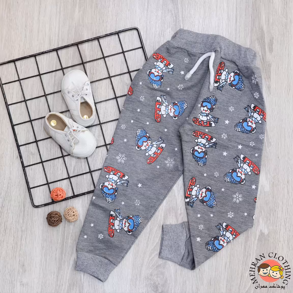 لباس بچه گانه -1323-شلوار نقلی طرح آدم برفی 