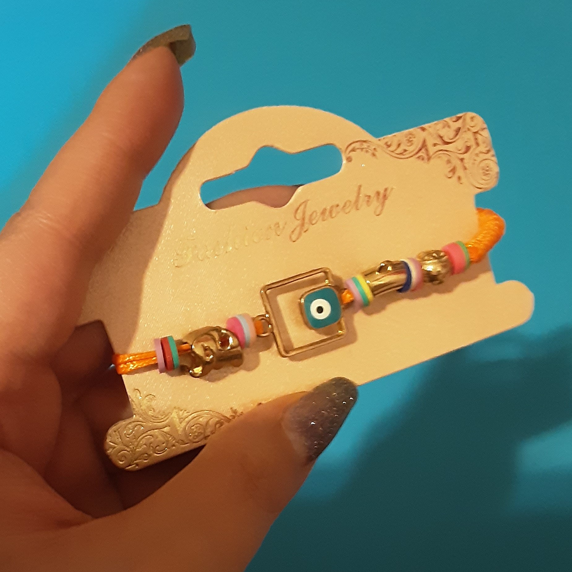 دستبند بافت.مدل بافت مفتولی.3لایه بافت.دارای پلاک چشم نظر.گوی.مفتول و فیل استیل طلایی آبکاری شده.ساخت ترکیه.