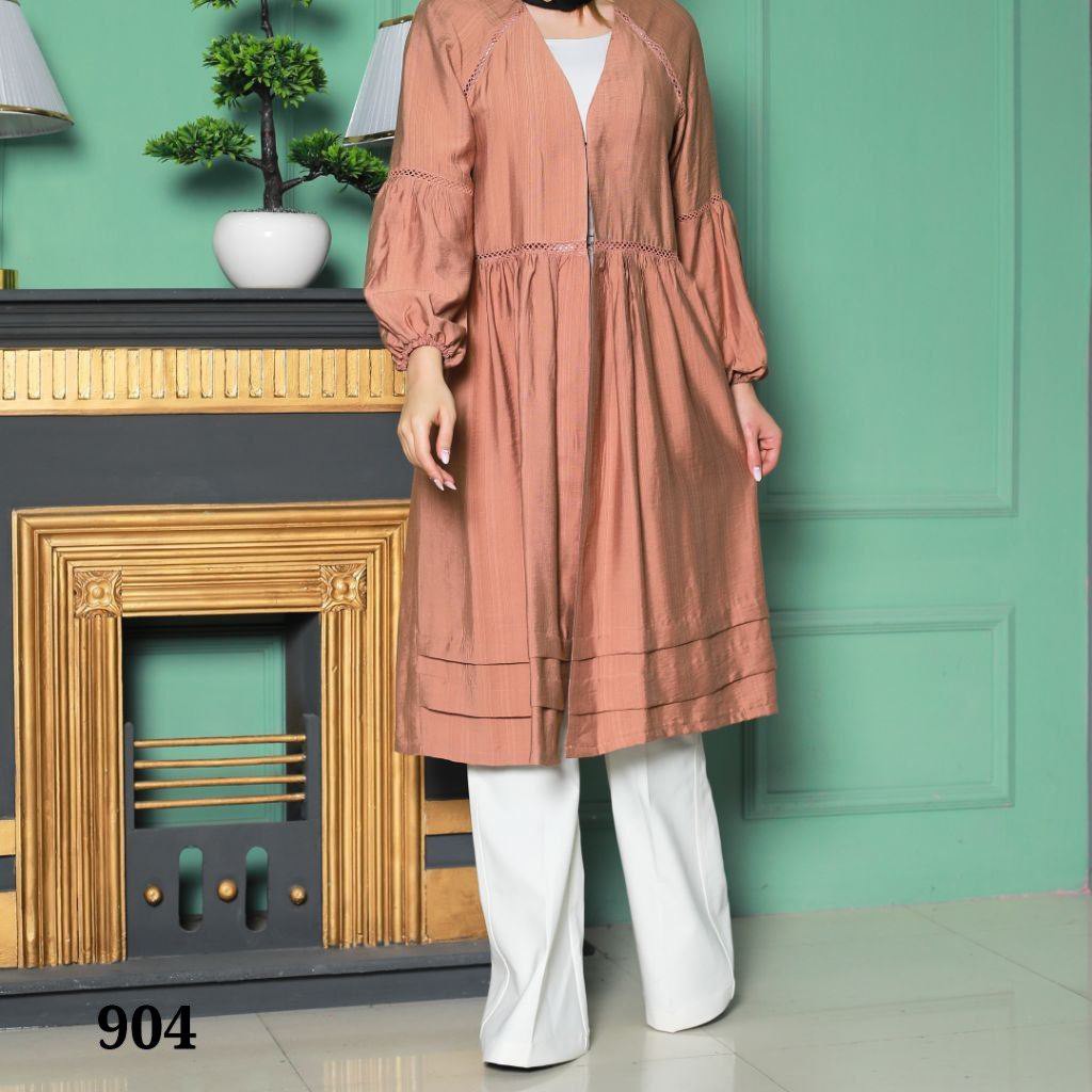 مانتو بابوس تن خورعالی پارچه چهارنخ کره ای  سه سایز از 38تا 54پشت کارساده که چاغ تر نشون نده قد استین بلند جلو غزن قد113