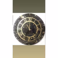 ساعت رزین مشکی طلایی دستساز