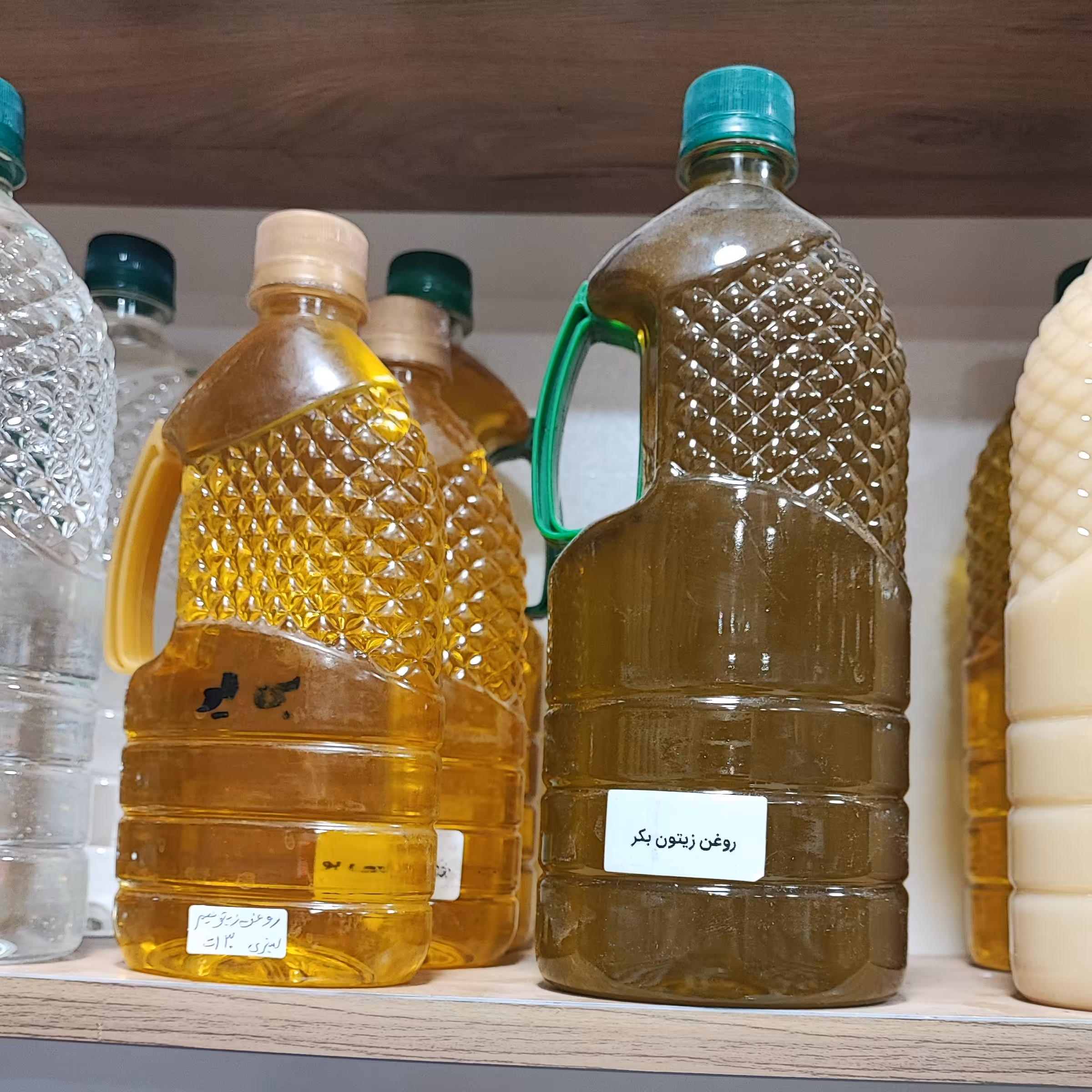 روغن زیتون نیم لیتری بی بو ارسال رایگان