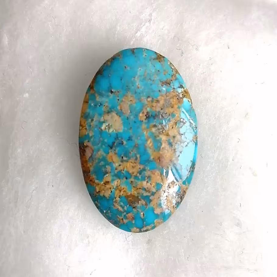 نگین فیروزه نیشابوری رگه طلایی مغز سنگ فوق العاده خوش رنگ و جلا و بسیار زیبا کیفیت اعلا مناسب انگشتر و آویز 