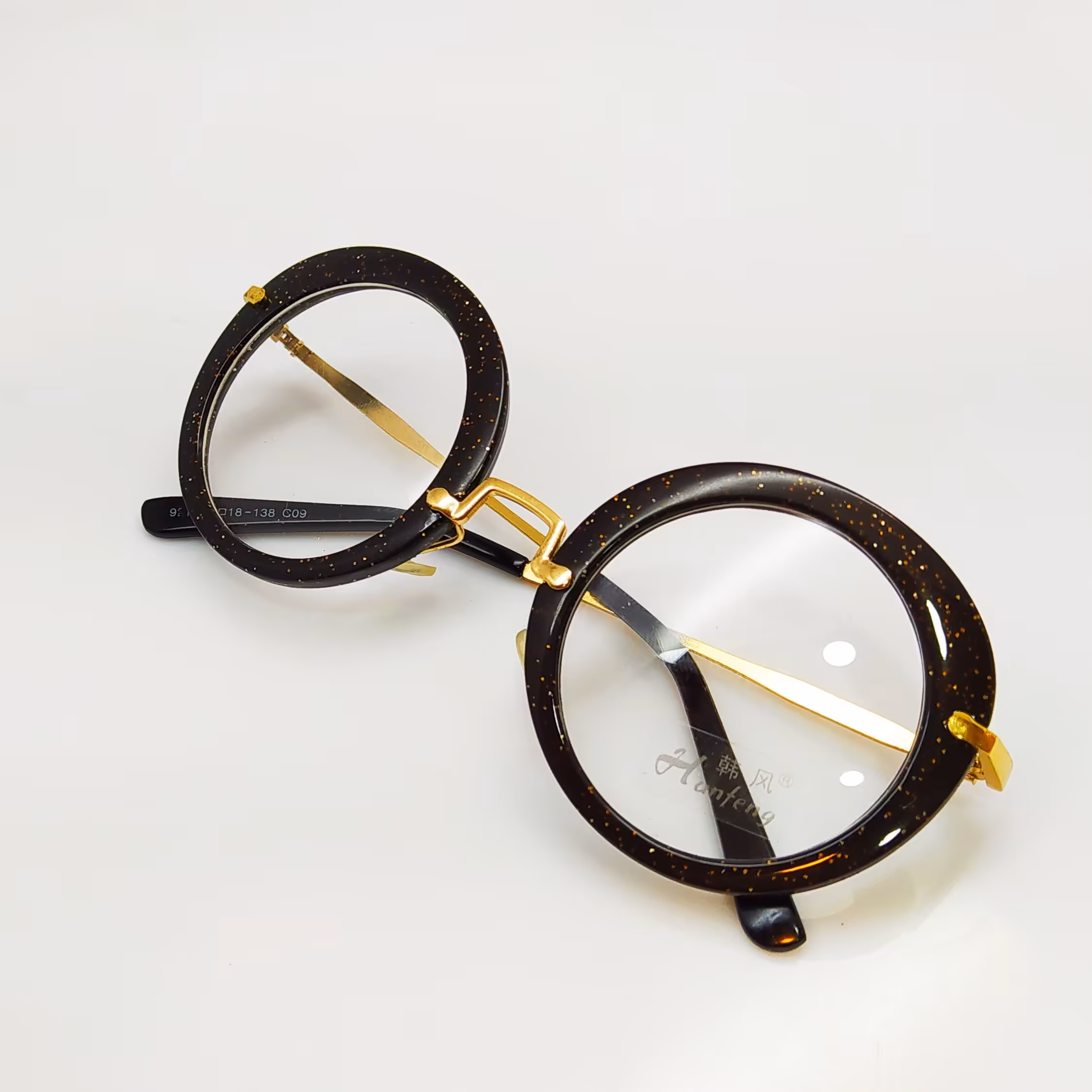 عینک طبی زنانه مدل گرد جنسیت فریم تمام قاب کائوچو و دسته فلزی