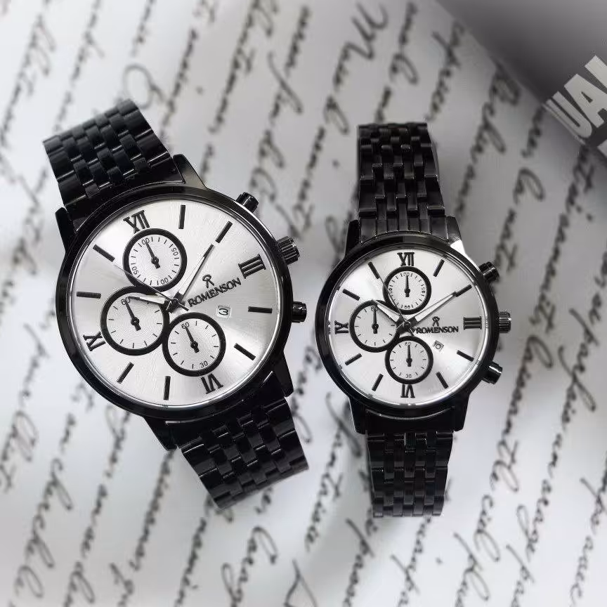 ست ساعت زنونه مردونه رومانسون  مشکی تقویم داره با جعبه و باطری 