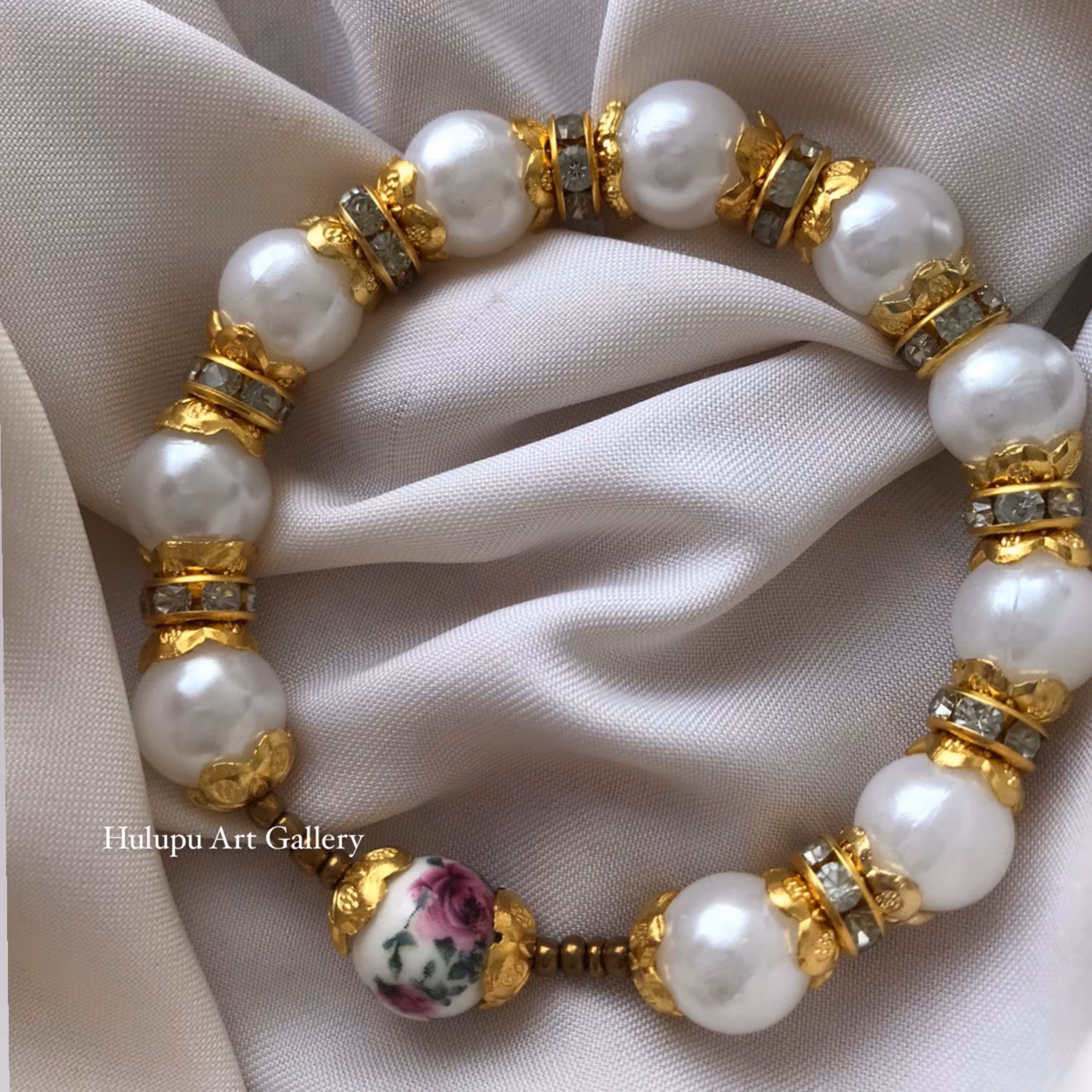 دستبند مهره گل سرخ