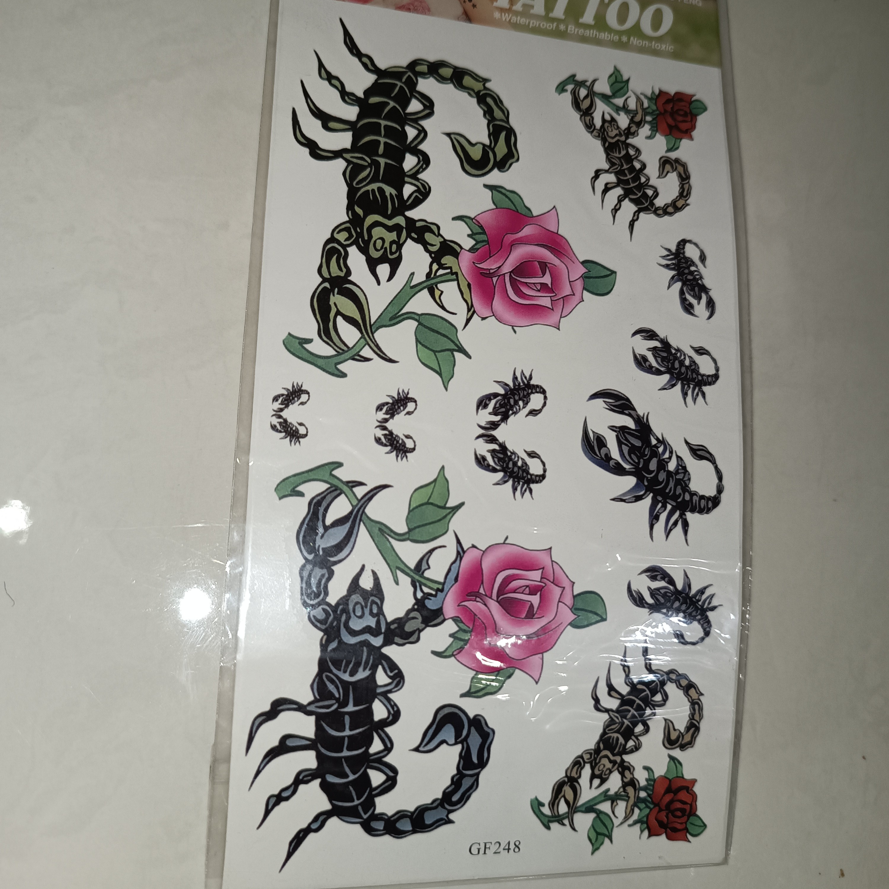 تاتو موقت طرح عقرب و گل