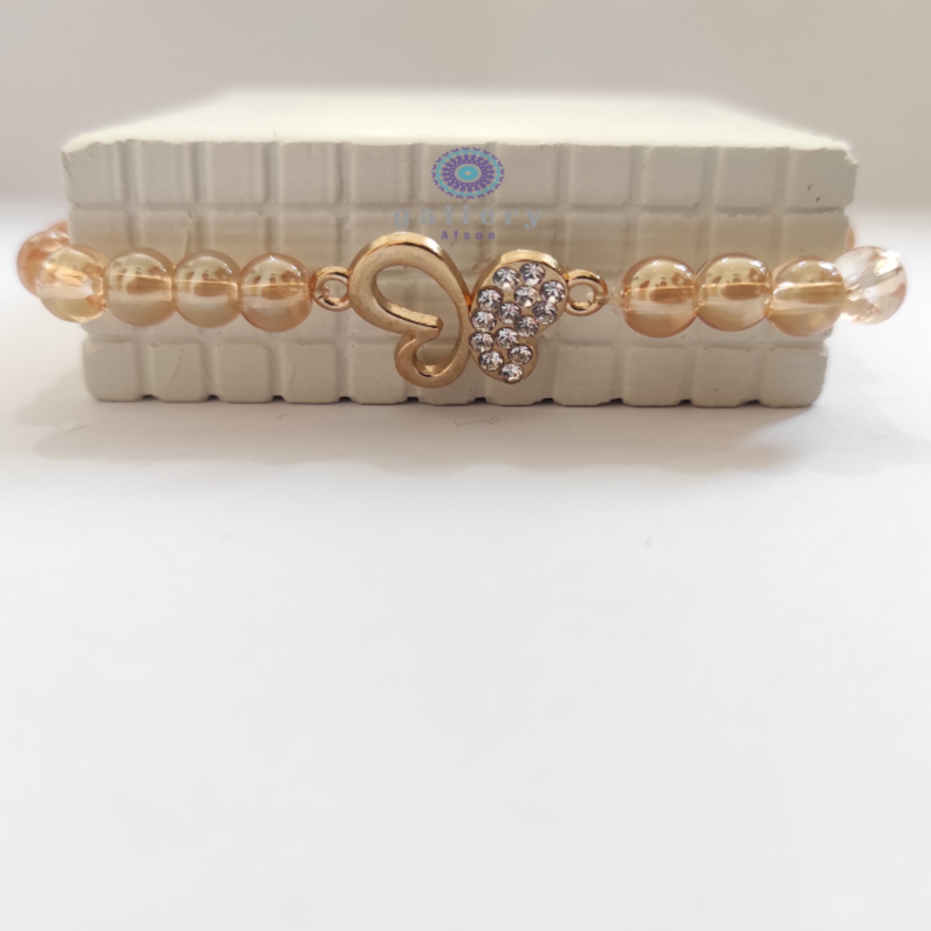 دستبند رنگ شامپاینی ( طرح پروانه ای )