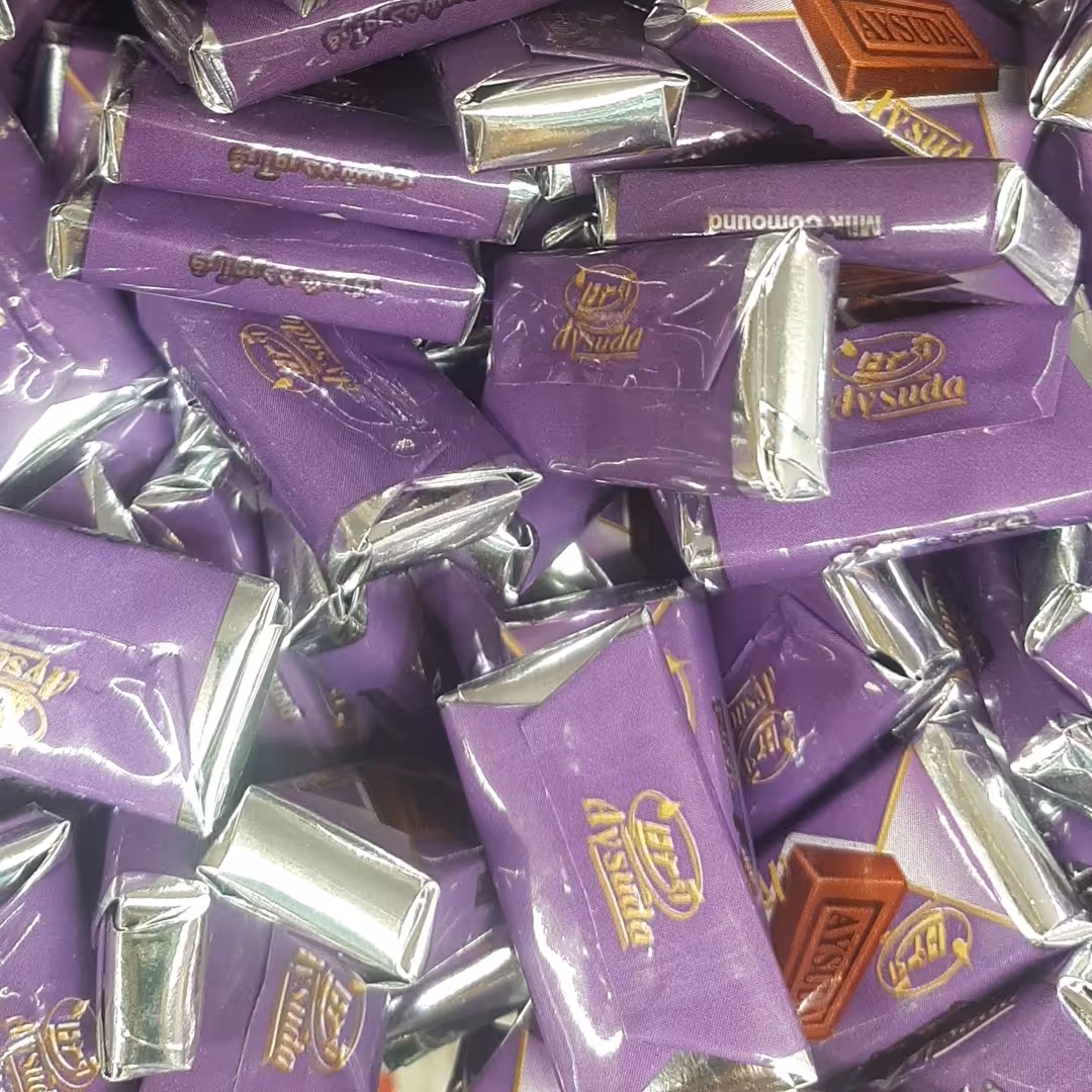 شکلات شیری آیسودا از 100گرم تا چند کیلو آجیل و خشکبار بادامک 