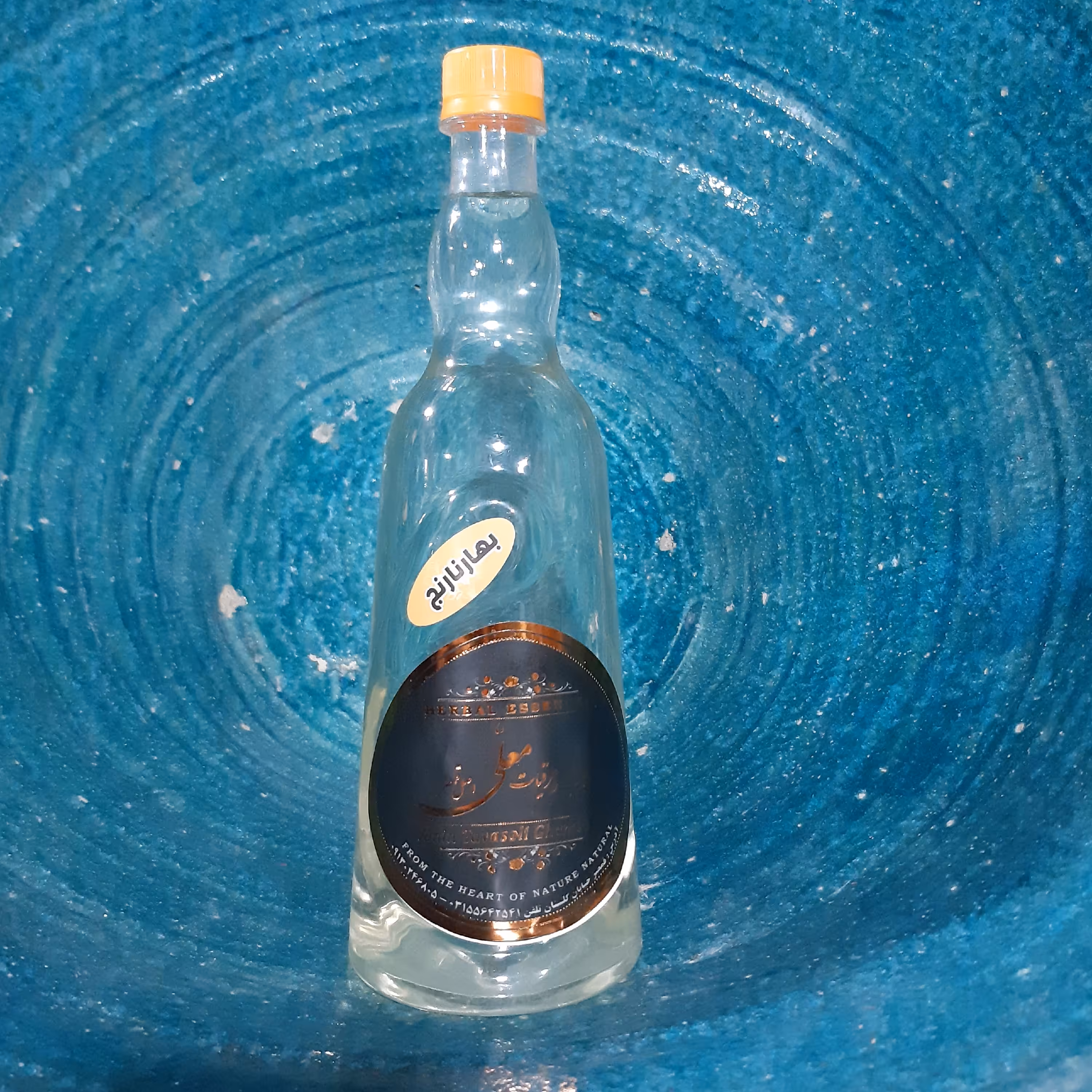 عرق بهار نارنج  900 گرمی-تهیه شده از گل های تازه و اصل بهار نارنج