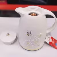 فلاسک نیم لیتری رگال طرح گل برجسته