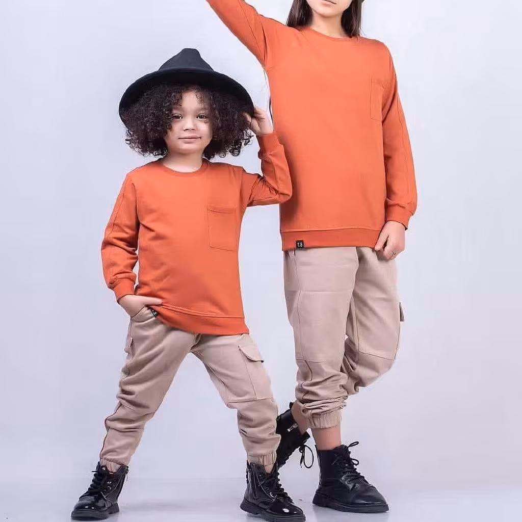 ست بلوز و شلوار اسپورت خواهر برادری کیفیت تضمینی جنس بلوز  دورس جنس شلوار کتان رنگبندی متنوع و زیبا مناسب 4 تا 10 سال 