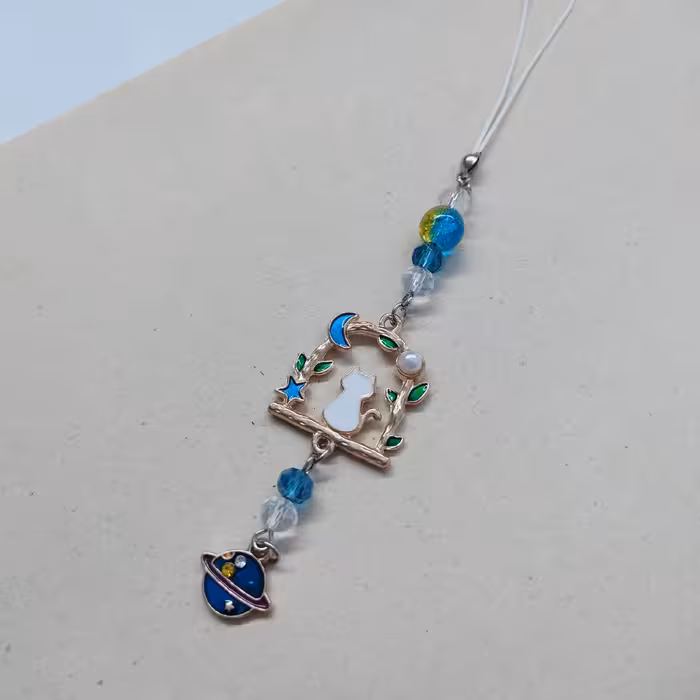 آویز موبایل ، آویز کیف ، آویز باکس ایرپاد و ... گربه و زحل آبی