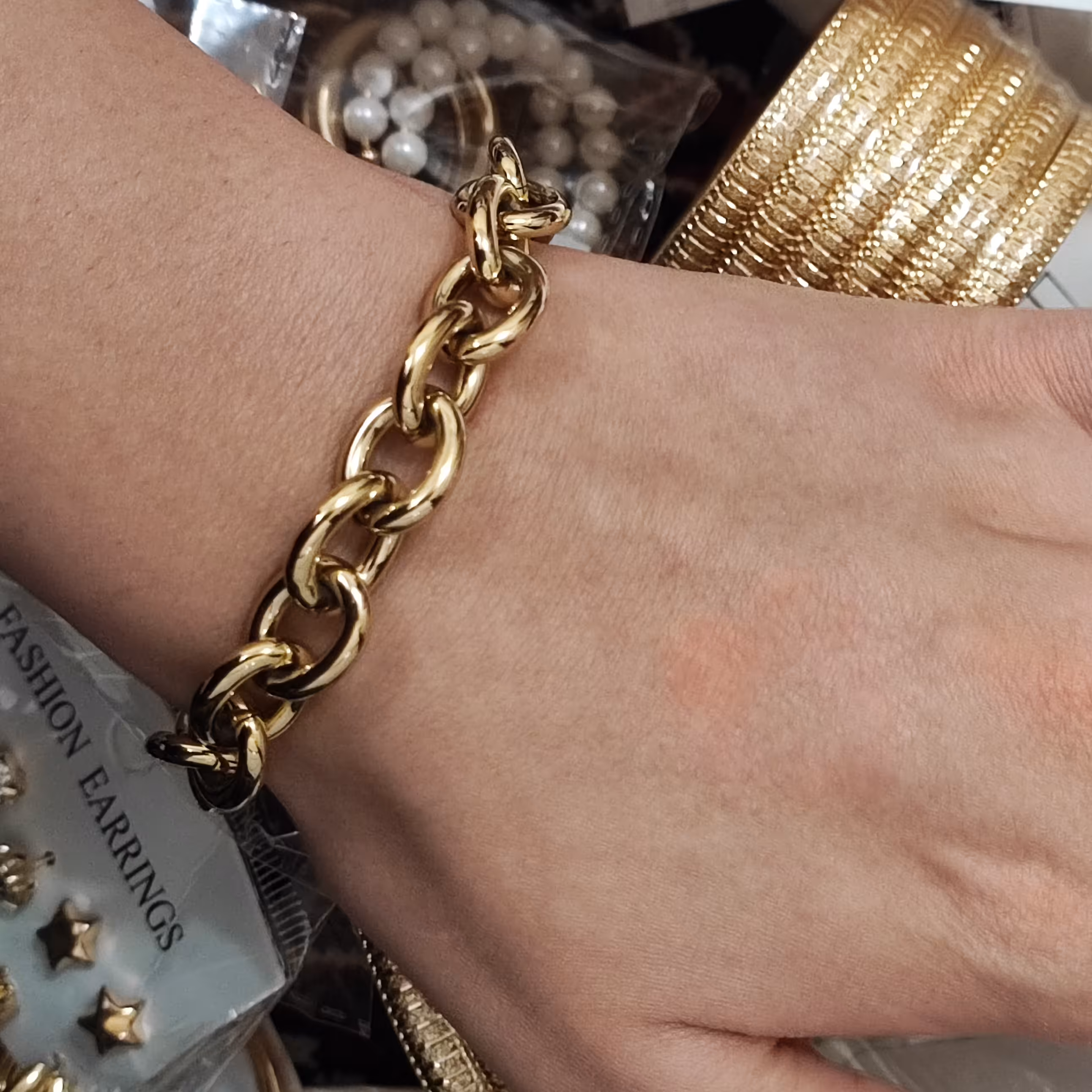 دستبند زنجیری مشابه طلا رنگ ثابت 