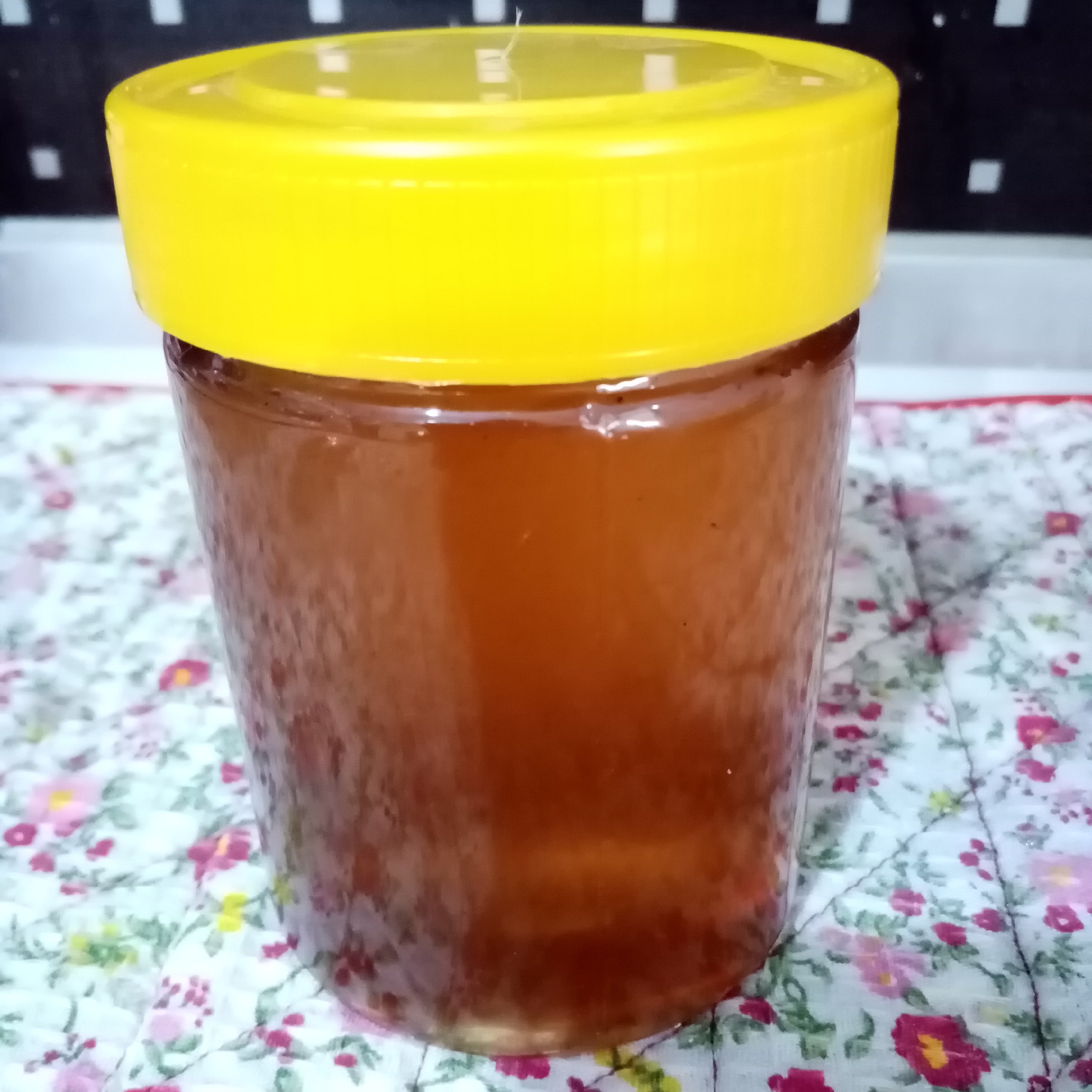 عسل چند گیاه خوش رنگ و خوشمزه نیم کیلویی