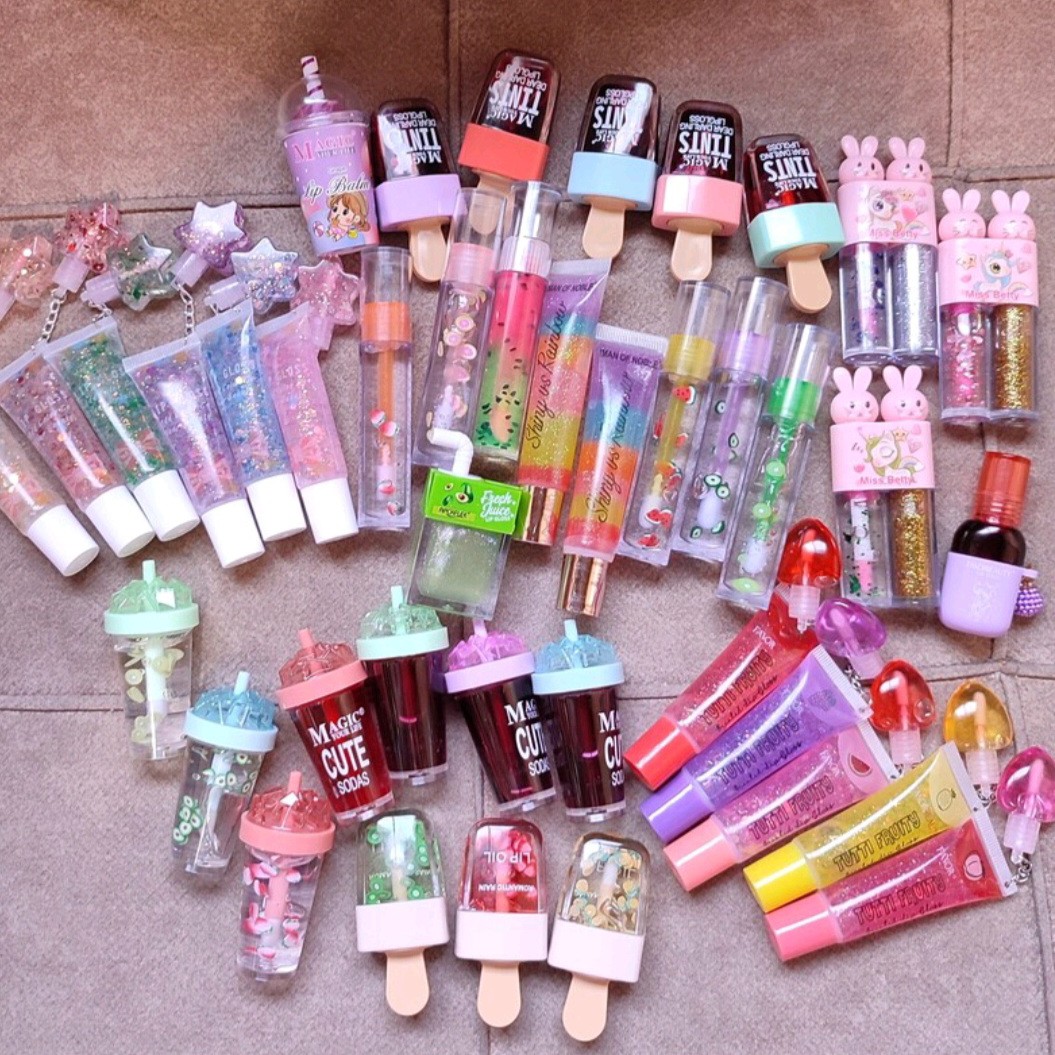 
برق لب جایزه دار و حرارتی آویزدار بالم لب ،آیس پک بستنی،ستاره ای شاین ،تینت لب بابونه نرم کننده 