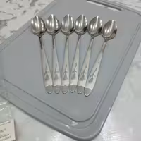 قاشق شربت خوری طرح گل میخک بسته 6 عددی جنس فولاد زد زنگ عیار 18 ضخامت 2 میل 