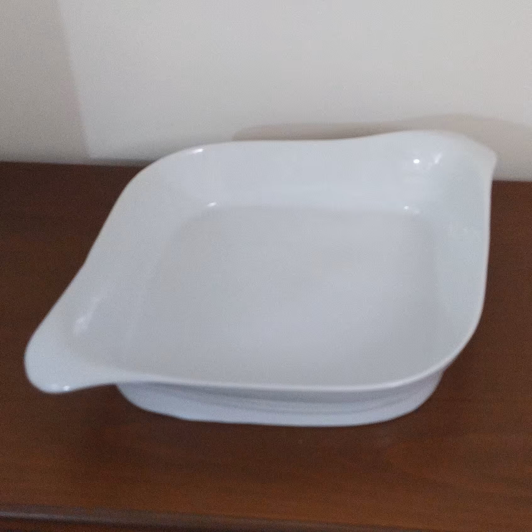 تابه لوزی دسته دار جنس چینی 