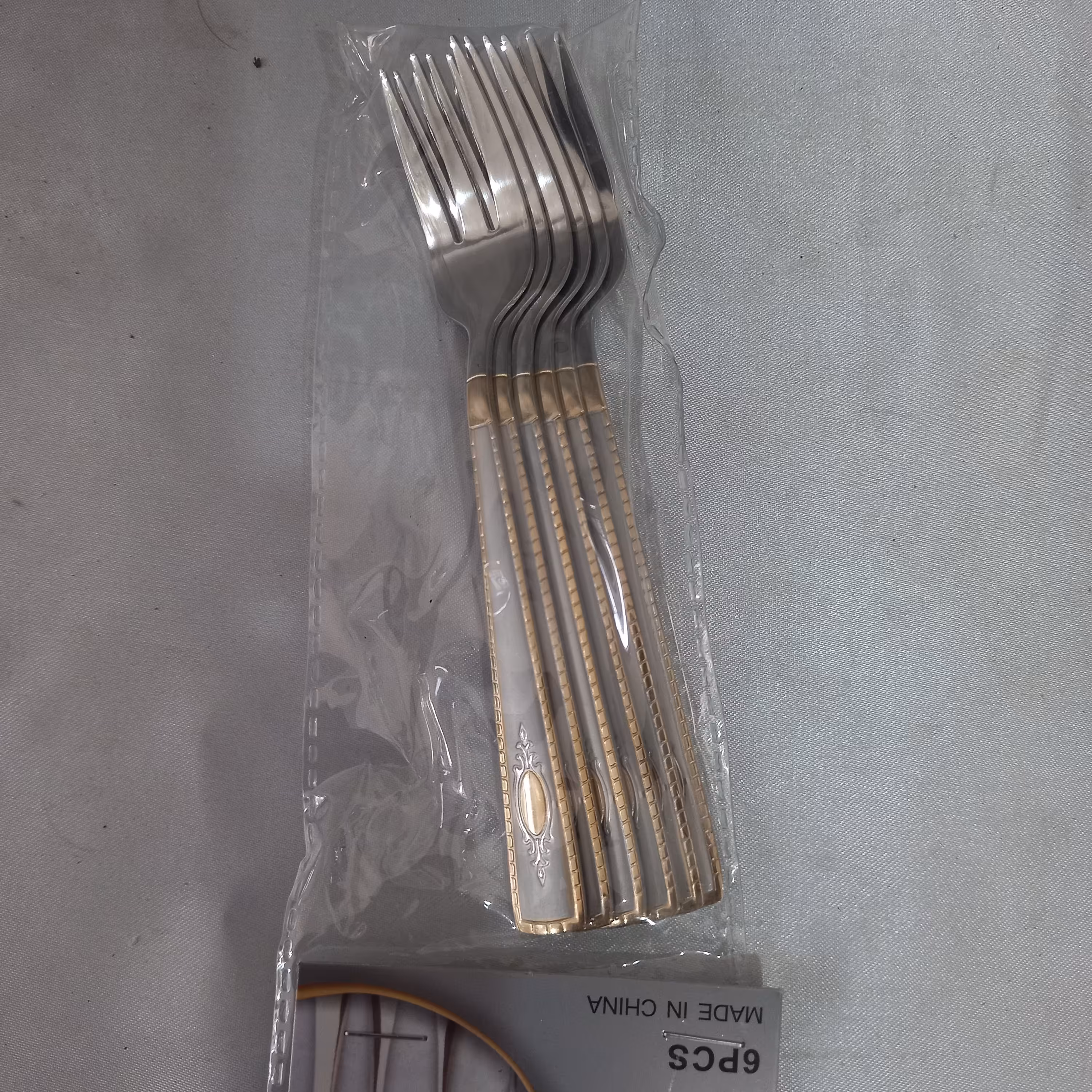 چنگال میوه خوری دسته طلایی 6عددی 