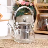 قوری پیرکس Arow ترک قابل استفاده بر روی شعله مستقیم صافی دار دسته استیل داغ نمیشه سایز 1200ml هزینه ارسال به عهده مشتری 