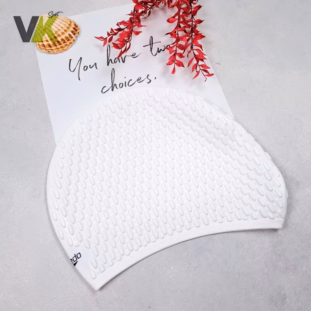 کلاه شنا عاج  دار  اسپیدو رنگ سفید قبل از ثبت سفارش موجودی بگیرید 