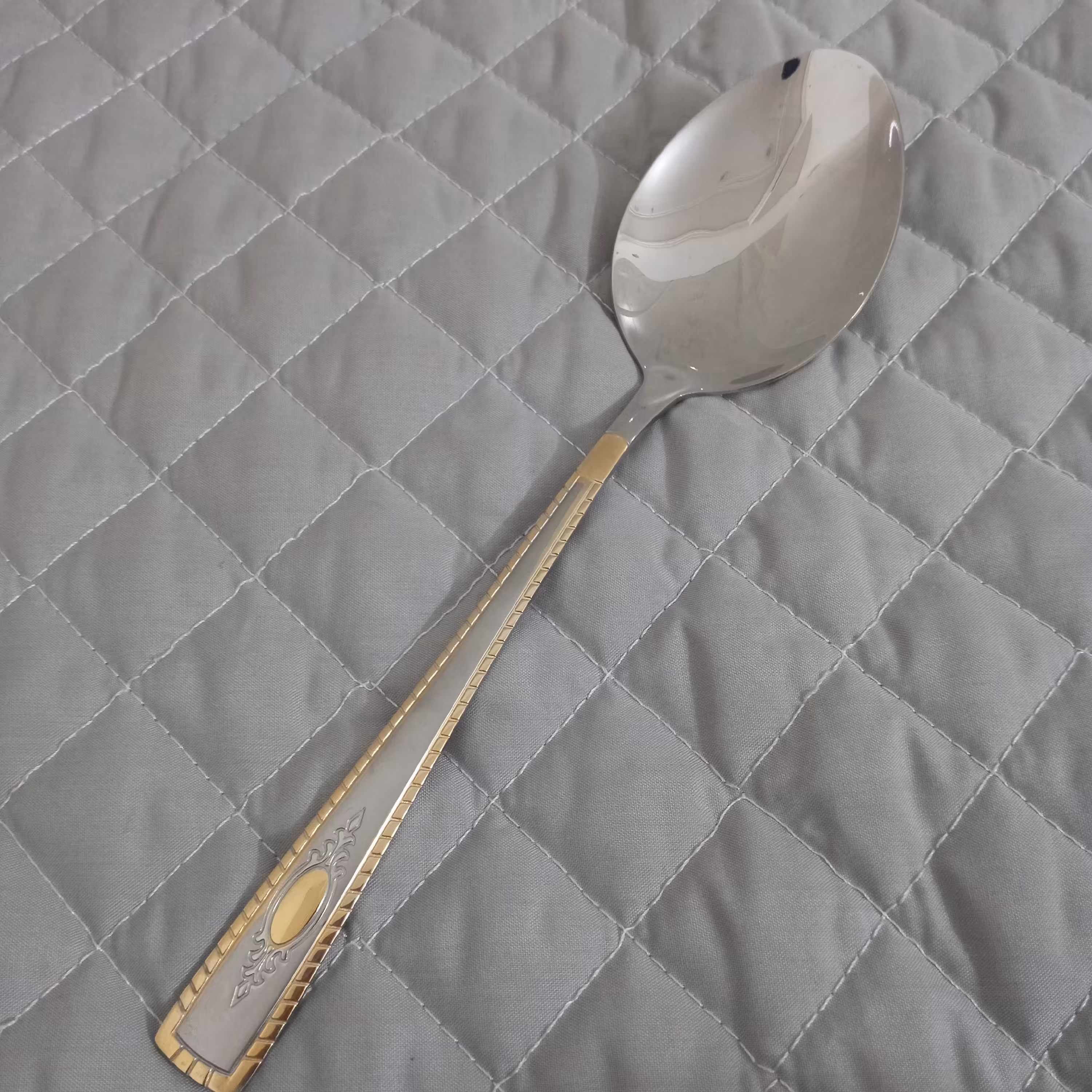 قاشق خورشت استیل طلایی یونیک لایف 