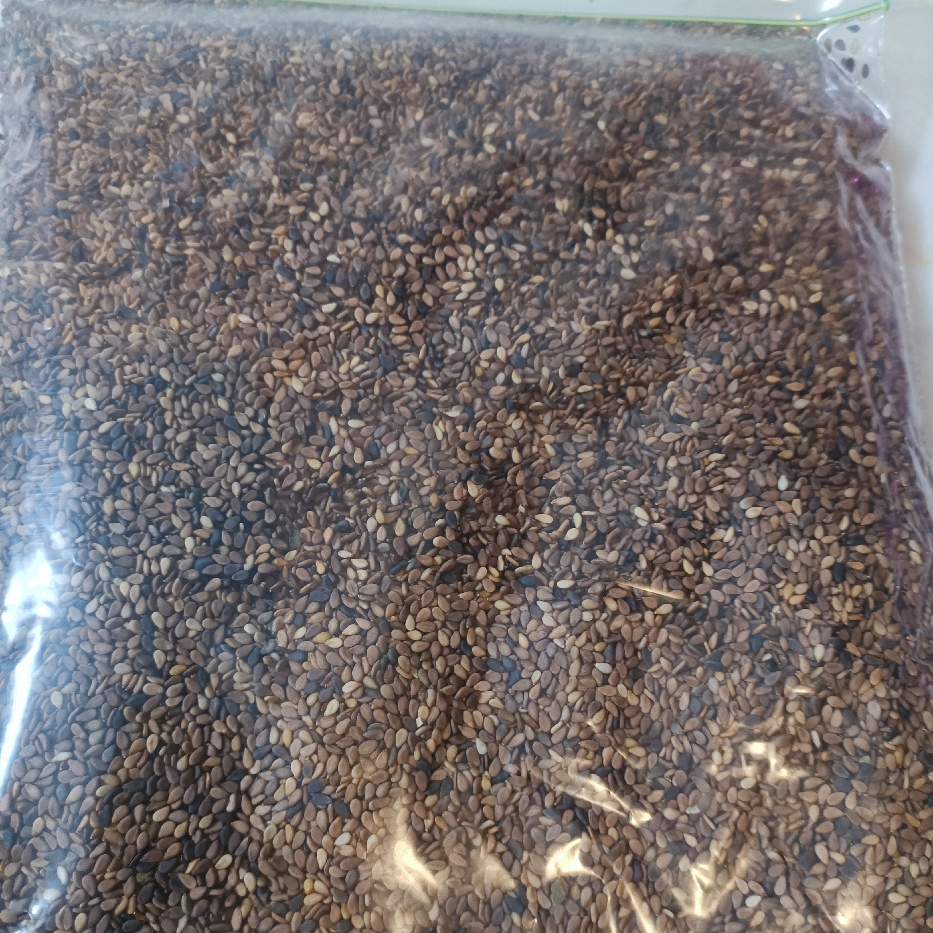 کنجد قهوه ای شسته شده  500 گرمی 