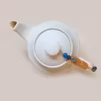 نگه دارنده درب قوری