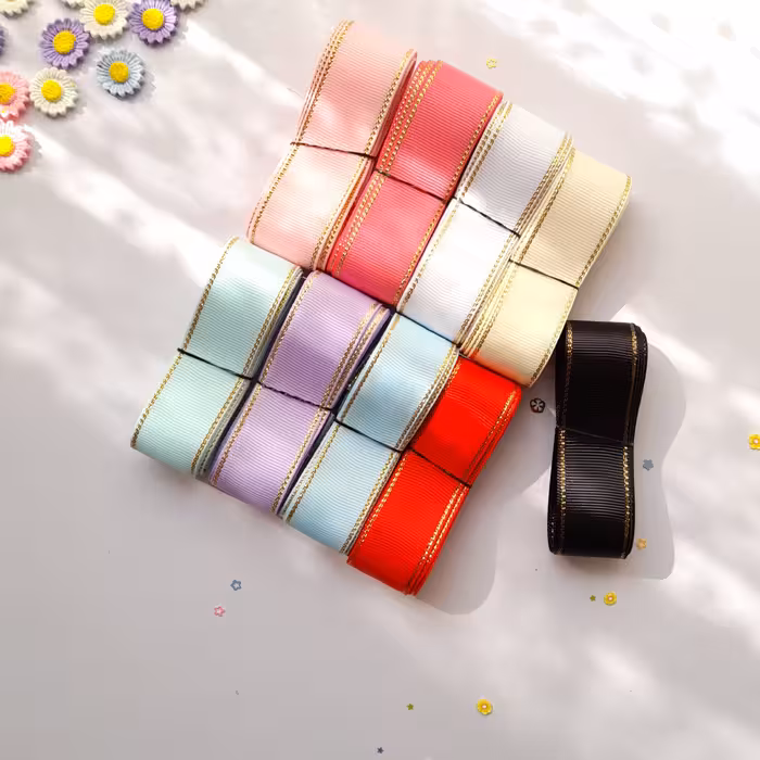 پک روبان گروگرن دو و نیم سانتی  لب زری در 9 رنگ زیبا و کاربردی.از هر رنگ 2متر