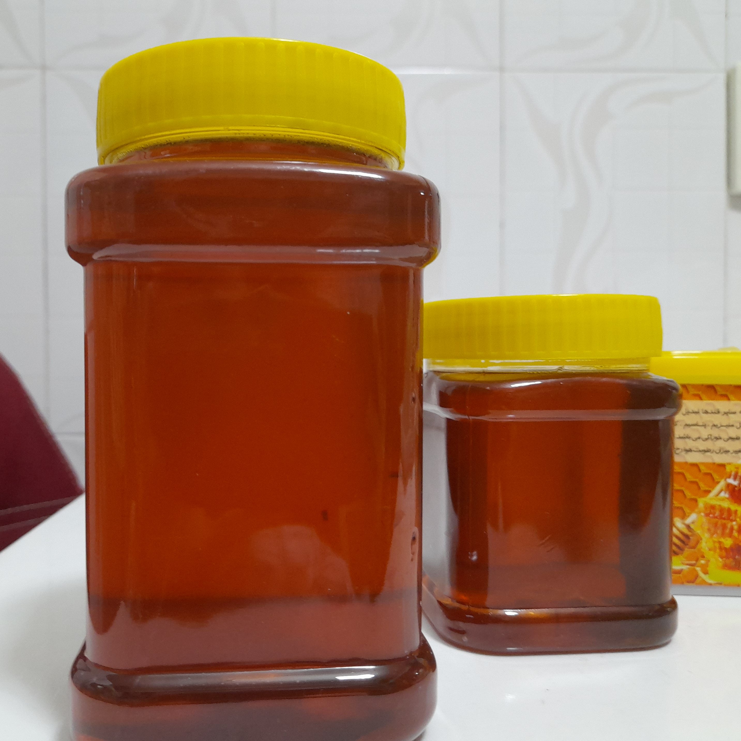 عسل طبیعی مشگین شهر از دامنه های سبلان یک کیلویی بدون موم
